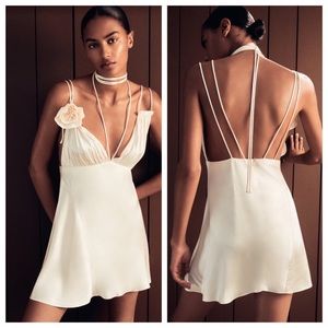 Zara satin short dress with adjustable tie and flower.